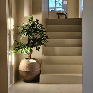 Skap høststemning med kunstige planter og dekor